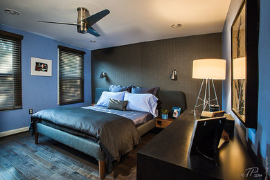 Mid-sized mid-century modern master dark wood floor and black floor bedroom photo in Baltimore with blue walls and no fireplace