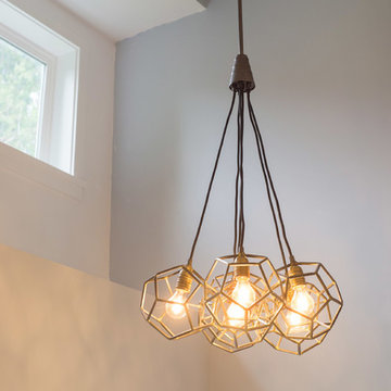 Outdated Alpine to Modern Living with a Vaulted Ceiling