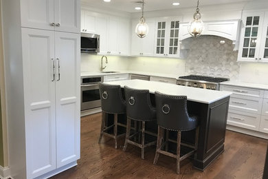 Example of a transitional kitchen design in New York