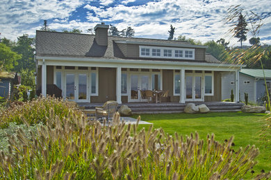 Example of a transitional exterior home design in Seattle