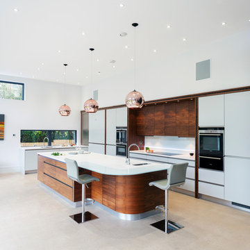 Stylish copper kitchen featuring accent lighting