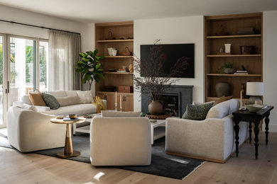 Example of a transitional living room design in Orange County