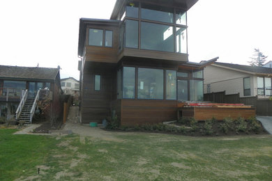 This is an example of a large modern two-storey exterior in Seattle.