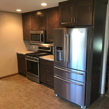Kitchen Transformation Done in a New Dark Stained Maple Cabinet