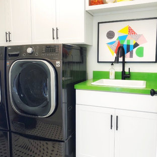Inspiration for a farmhouse separated utility room in Other with a built-in sink, shaker cabinets, white cabinets, white walls, a side by side washer and dryer, multi-coloured floors and green worktops.