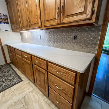 Partial kitchen update added cabinets to match existing cabinetry