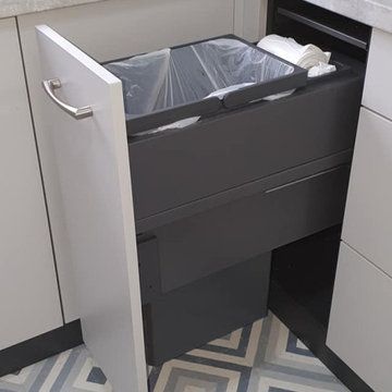 Concealed kitchen bin unit