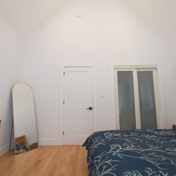 Tall Gabled Bedroom Ceiling with Integrated Eaves Storage | East York
