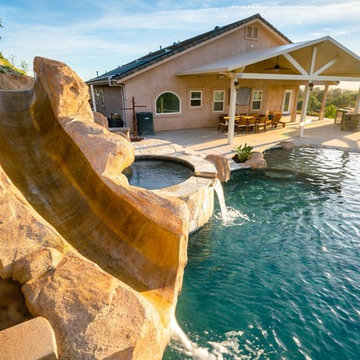 Pool with slide, water fall and fire feature!