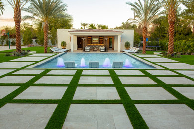 Example of a large trendy home design design in Phoenix