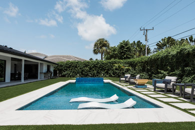 Example of a trendy home design design in Miami