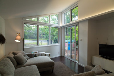 This is an example of a contemporary living room in Canberra - Queanbeyan.