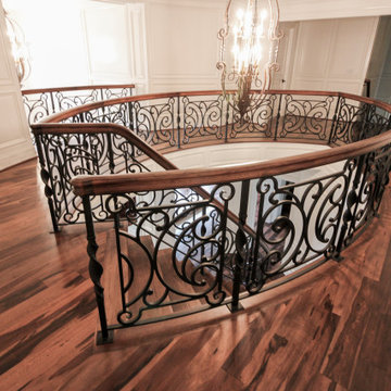 Project #74 | Circular Staircase with Hand-Forged Metal Panels