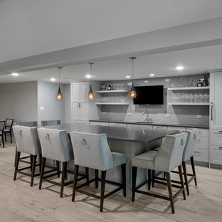Inspiration for a large contemporary walk-out basement in Chicago with grey walls and porcelain flooring.