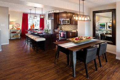 Inspiration for a rustic dining room remodel in Calgary