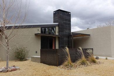 Example of an exterior home design in Albuquerque