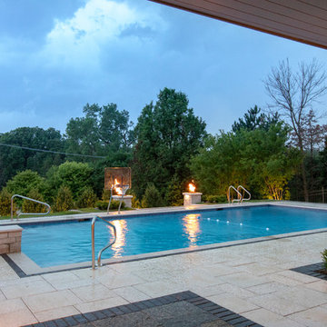Burr Ridge Lap Pool with Raised Hot Tub and Waterfall