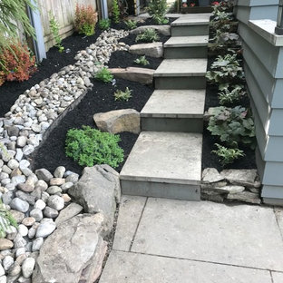 Photo of a medium sized eclectic straight staircase in Philadelphia with slate treads and slate risers.