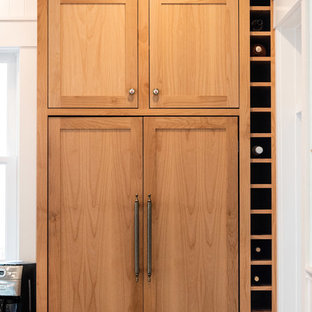 Large eclectic kitchen pantry photos - Kitchen pantry - large eclectic u-shaped porcelain floor and multicolored floor kitchen pantry idea in San Luis Obispo with shaker cabinets, white cabinets and two islands