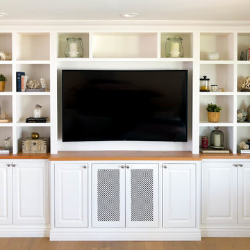 White entertainment center with cubby-style shelves