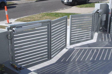 Trackless Bi Fold Gates - Dover Heights