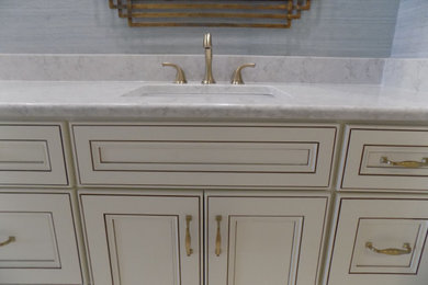 Mid-sized french country master double-sink bathroom photo in Jacksonville with shaker cabinets, beige cabinets, quartzite countertops, white countertops and a built-in vanity