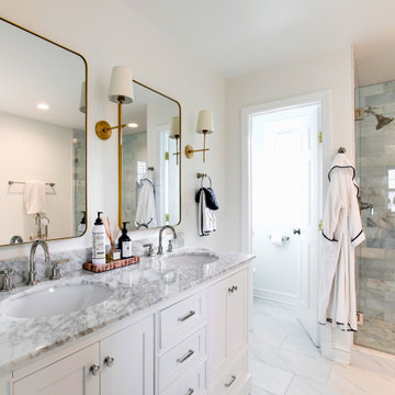 Primary Bathroom with Double Vanity and Custom Tile Shower Enclosure