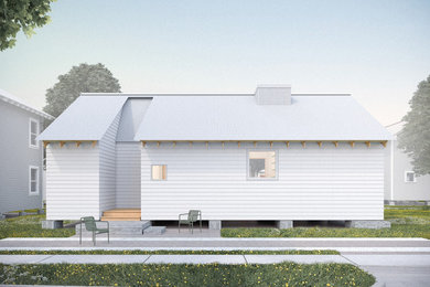 Modelo de fachada de casa gris y gris actual pequeña de una planta con revestimiento de aglomerado de cemento, tejado a dos aguas, tejado de metal y tablilla