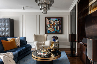 This is an example of a medium sized eclectic formal and grey and brown living room in London with grey walls, dark hardwood flooring, a built-in media unit and panelled walls.