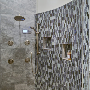 Elegant Curved Shower Highlights New Spacious Master Bath