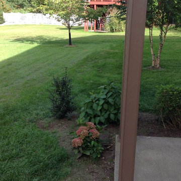 AZEK Deck with Timbertech Builderrail and Genovations Brownstone post wraps