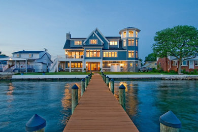Huge transitional blue concrete exterior home photo in Baltimore