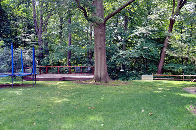 Deck - small transitional backyard deck idea in Other