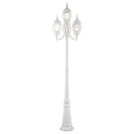 Livex Lighting - Textured White Traditional, Colonial, French Historical, Outdoor Post Light - The classically transitional outdoor Frontenac collection boasts a cast aluminum structure with dazzling ornamental design.  The upwards facing four-head ground post light comes in a textured white finish with clear beveled glass and extravagantly decorative scrolls. The ornate quality of this light will add radiance to your house exterior day or night.