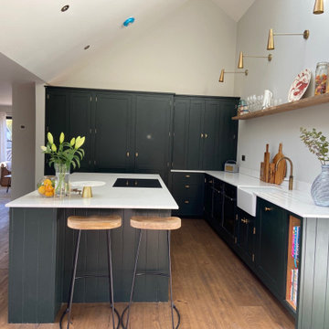 Large handmade kitchen with kitchen island and full length larder