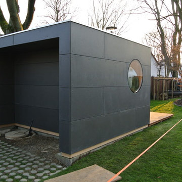 Gartenkubus mit Terrasse und Holzablagemöglichkeit