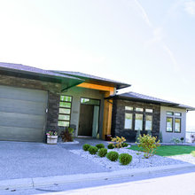 Wide Low Hip Roof With Exaggerated Overhangs