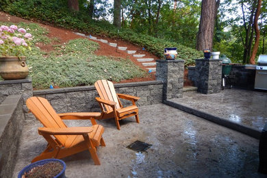 Mid-sized elegant backyard concrete patio kitchen photo in Las Vegas with no cover