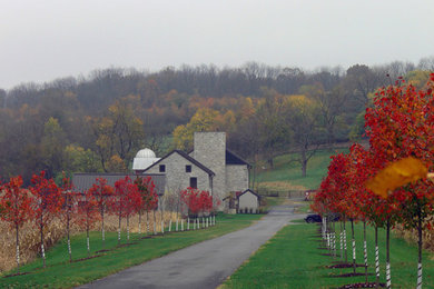 Example of a farmhouse exterior home design in Philadelphia