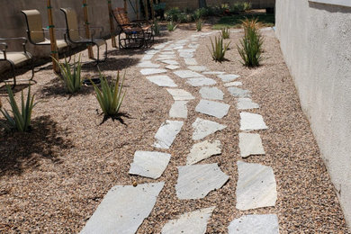Pea gravel with stone pathway and grass, Las Vegas NV