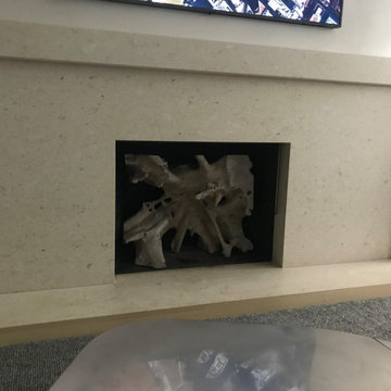 Decorative Fireplace with Tree Root Sculpture
