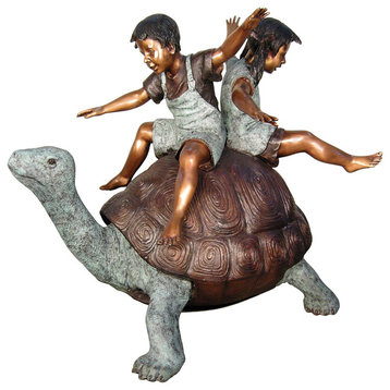 2 Kids Balancing on a Tortoise