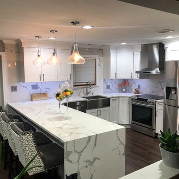 Contemporary Latte (White) Kitchen Remodel with waterfall counter top edge