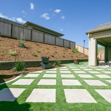 Grass and Pavers Backyard Design Ideas