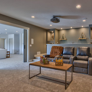 Inspiration for a medium sized modern enclosed home cinema in Omaha with grey walls, carpet and a projector screen.