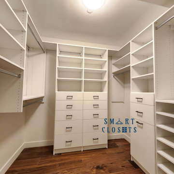 Customized Master Walk In Closet and Home Office Desk Designed By Smart Closets