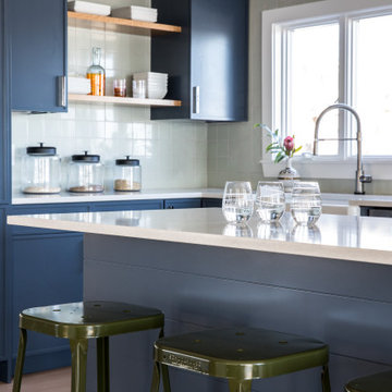 Blue Cabinets with Green Kitchen Tiles