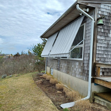Retractable Window Awnings for a home on Cape Cod