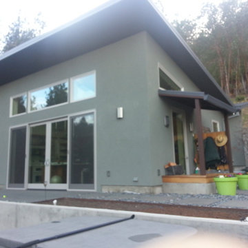 Modern, Energy Efficient Home with outdoor living space, raised bed gardens
