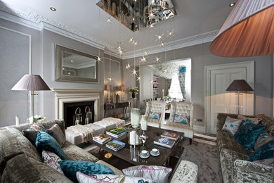 Photo of a large contemporary formal open plan living room in London with grey walls, carpet, a standard fireplace, a stone fireplace surround and a built-in media unit.